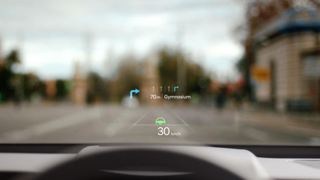 A shot of The all-new KONA's HUD. Information on going to Gymnasium and the current speed of the vehicle are displayed on the HUD.