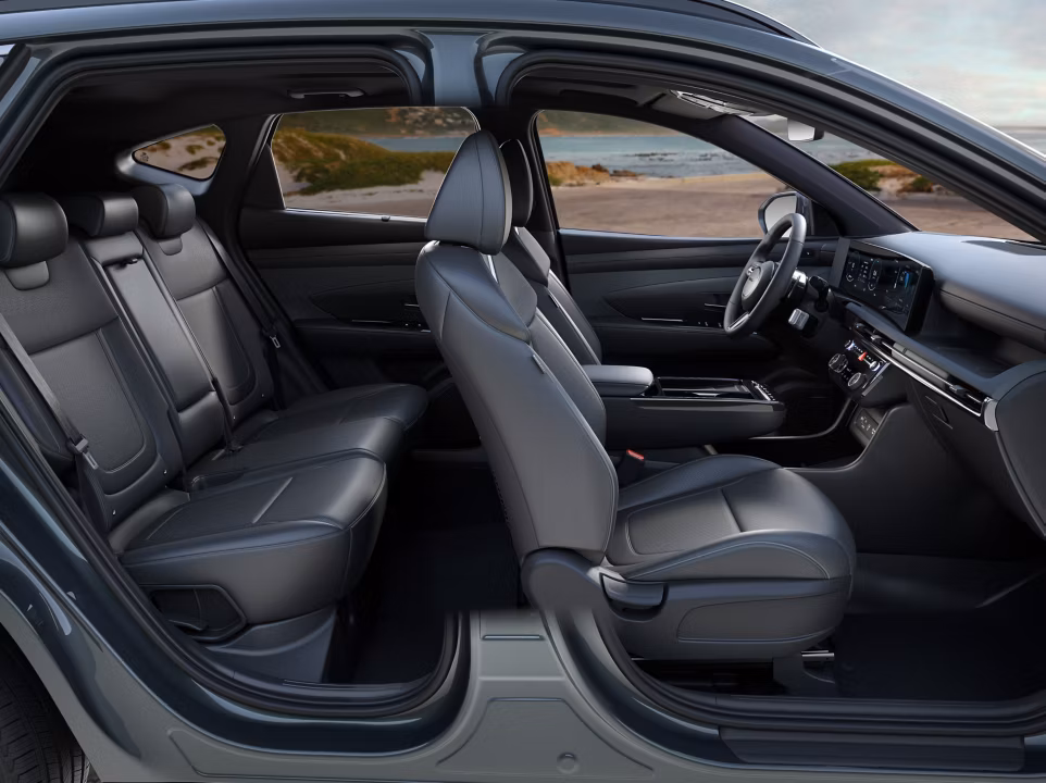 Comfortable five seats of the Hyundai TUCSON Plug-in Hybrid pictured from the side. 
